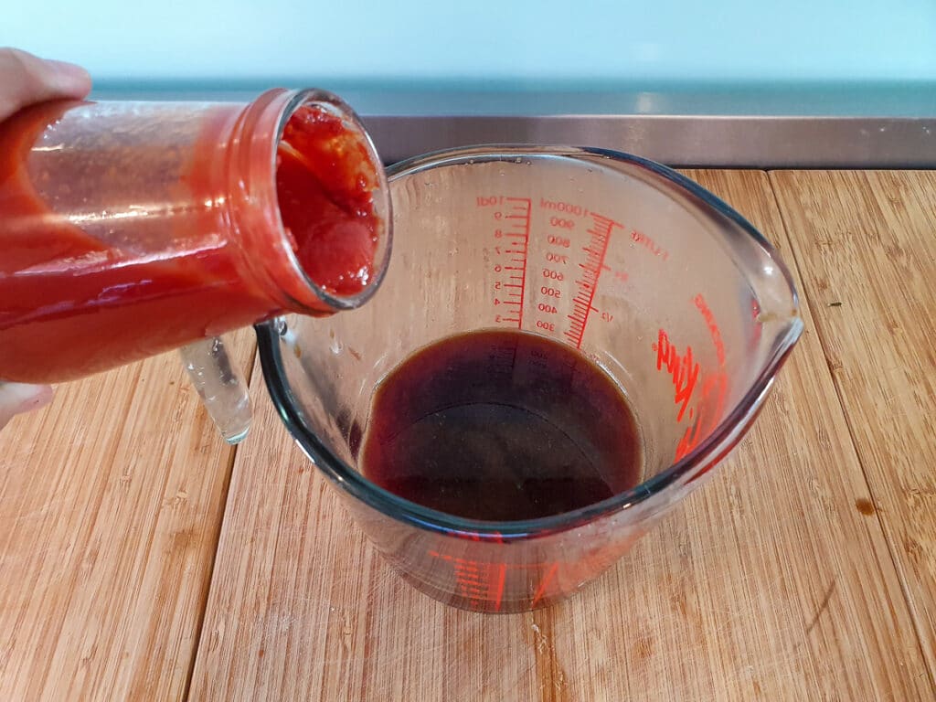 Slow cooker lamb ragu 16 Adding passata to sauce.