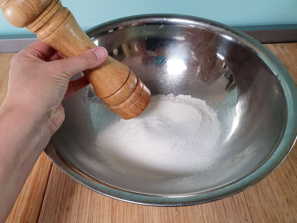Pikelets 7 Adding salt to dry ingredients.