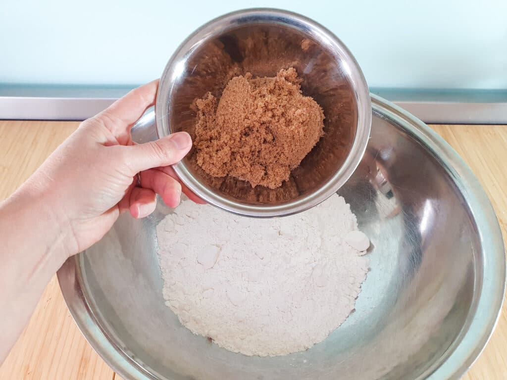 Adding brown sugar.
