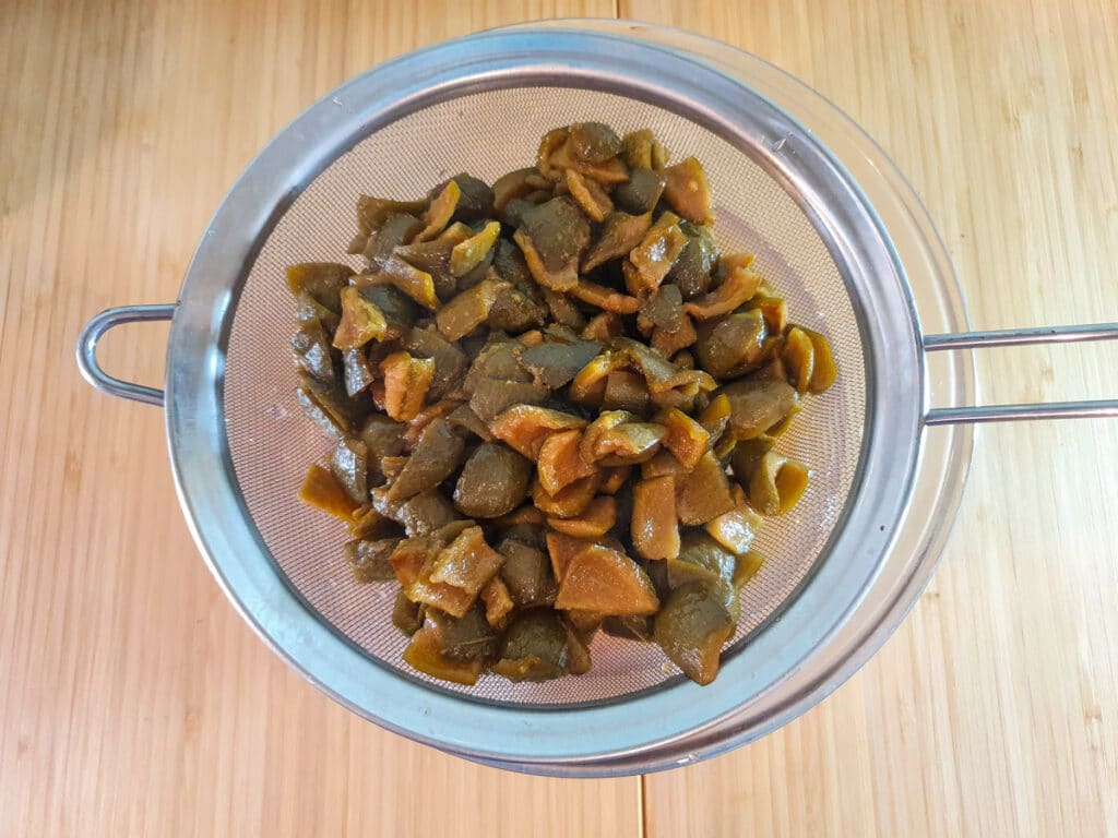 Straining syrup.