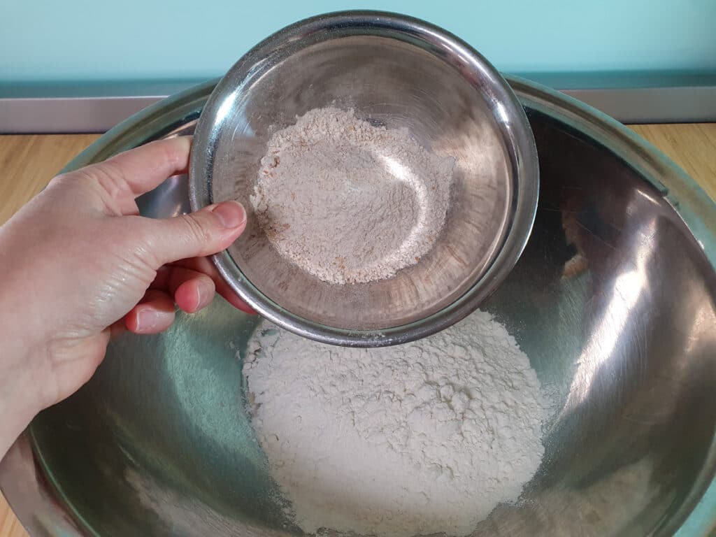 Cheesymite Scrolls 6 Adding wholemeal flour to plain flour.