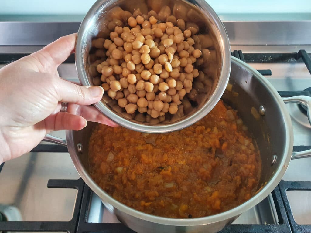 Pumpkin and Sweet Potato Soup 15 Adding drained chickpeas.