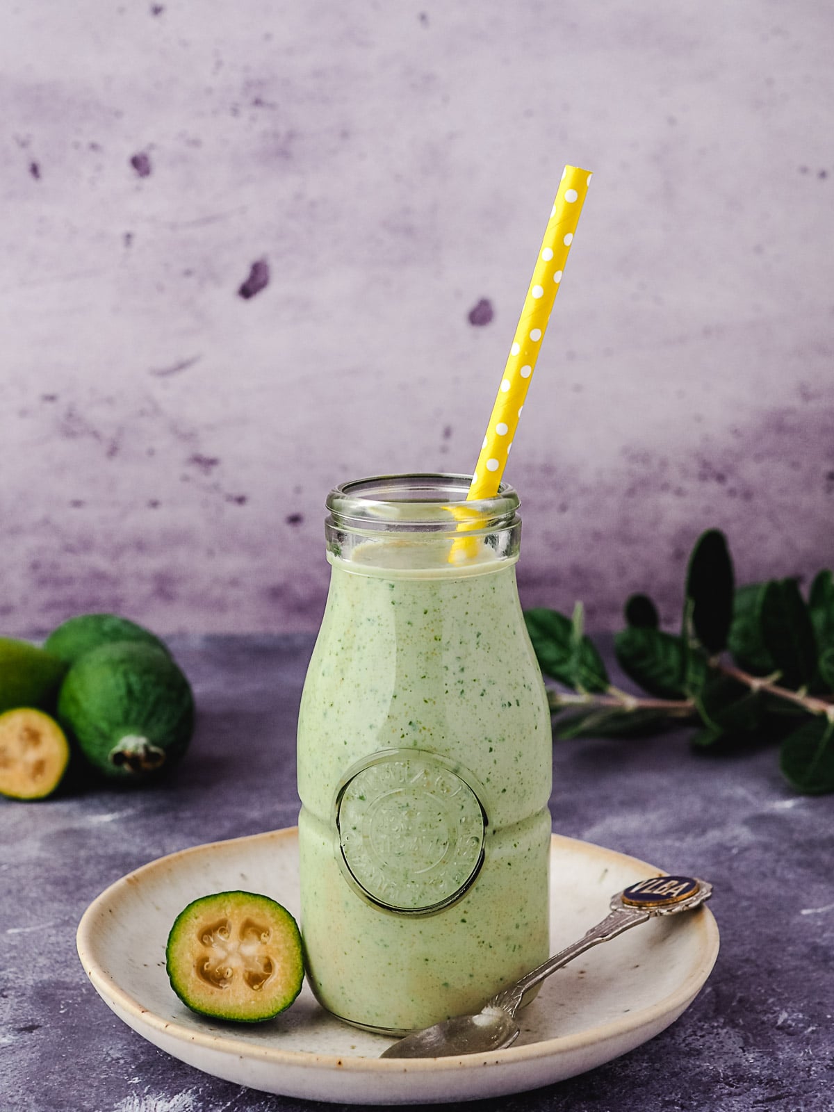 Feijoa Smoothie 10 Feijoa smoothie with straw.