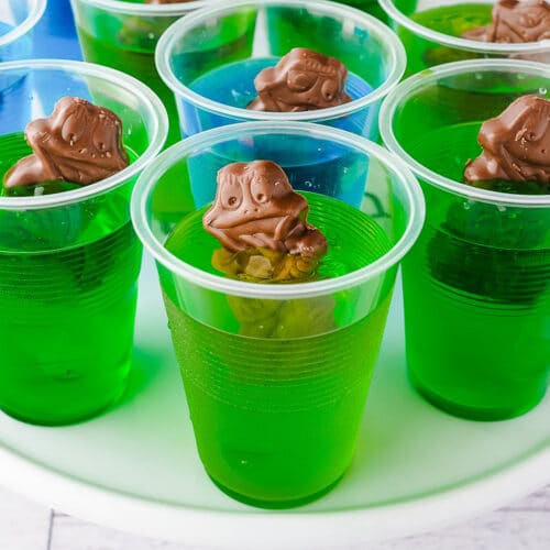 Frog In The Pond 5 Close up jelly cups on a plate.